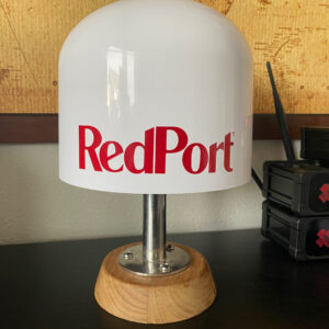 redport glow on stand with redport logo showing